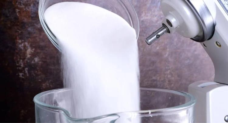 Adding sugar.