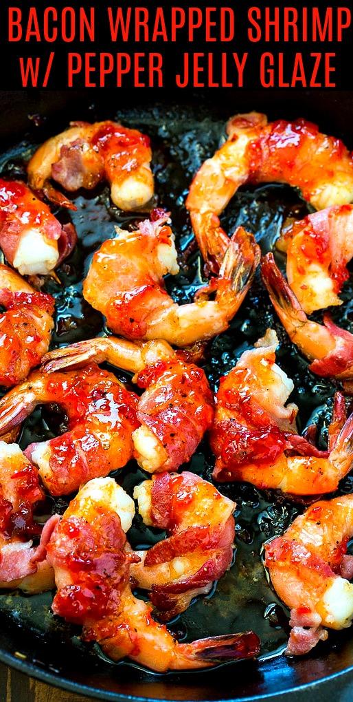 Shrimp wrapped in bacon in cast iron pan.