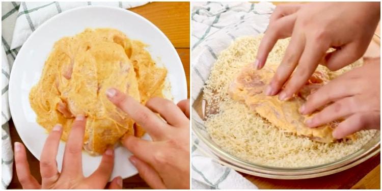 Coating chicken in mayonnaise and Panko crumbs.