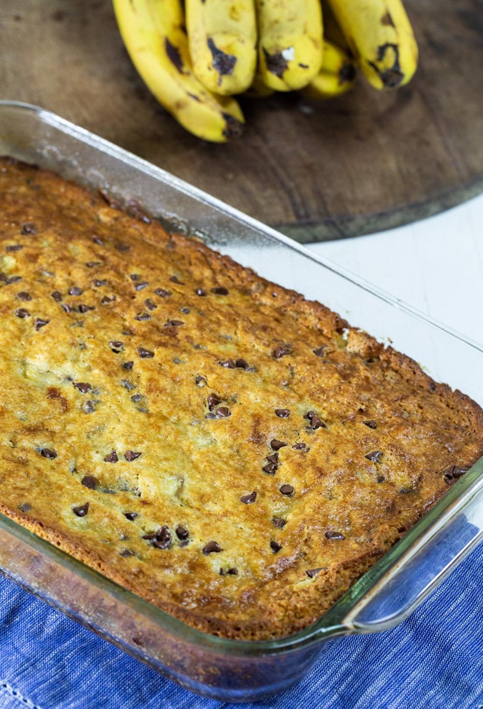 Unfrosted cake in baking dish.
