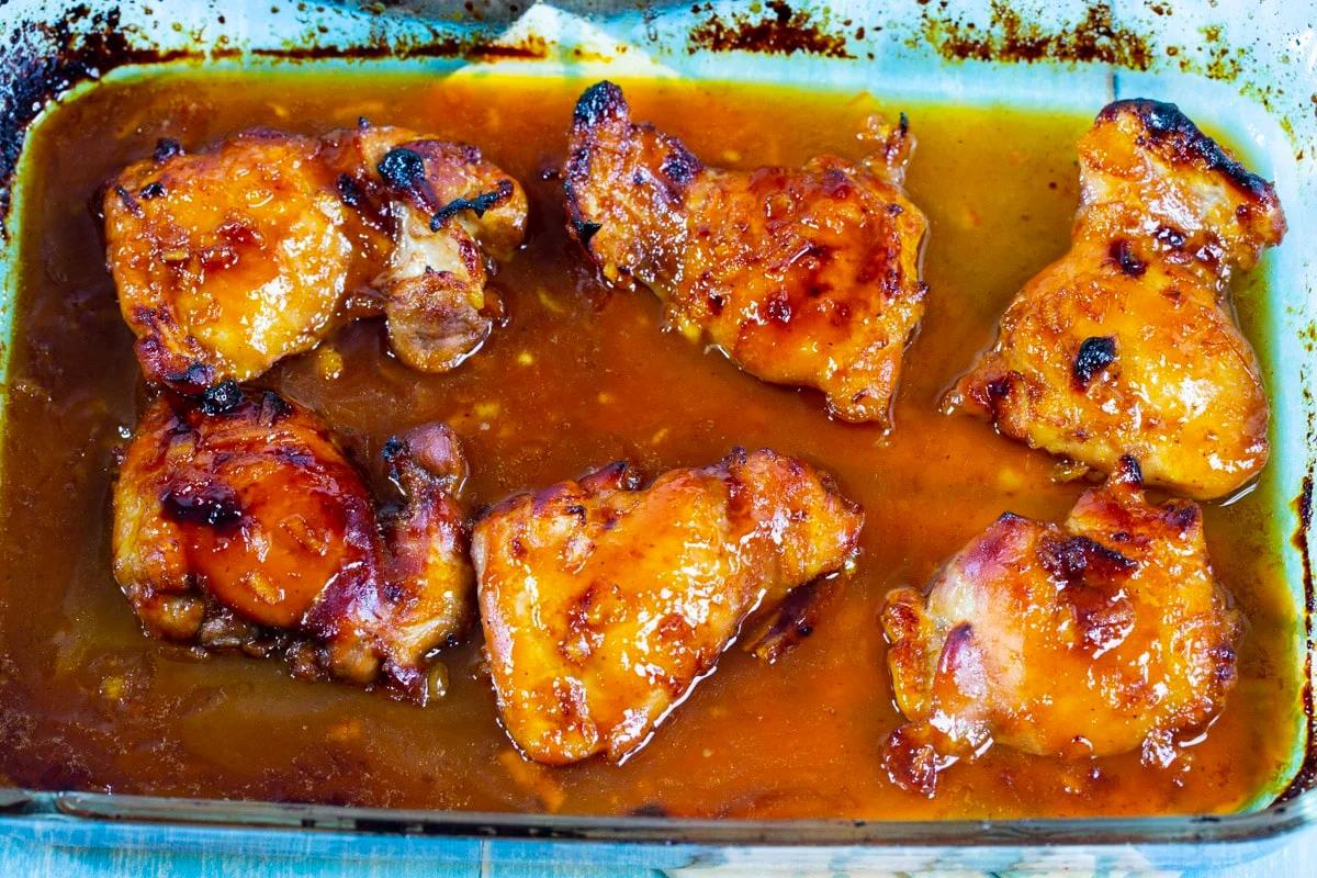 Baked chicken in baking dish.