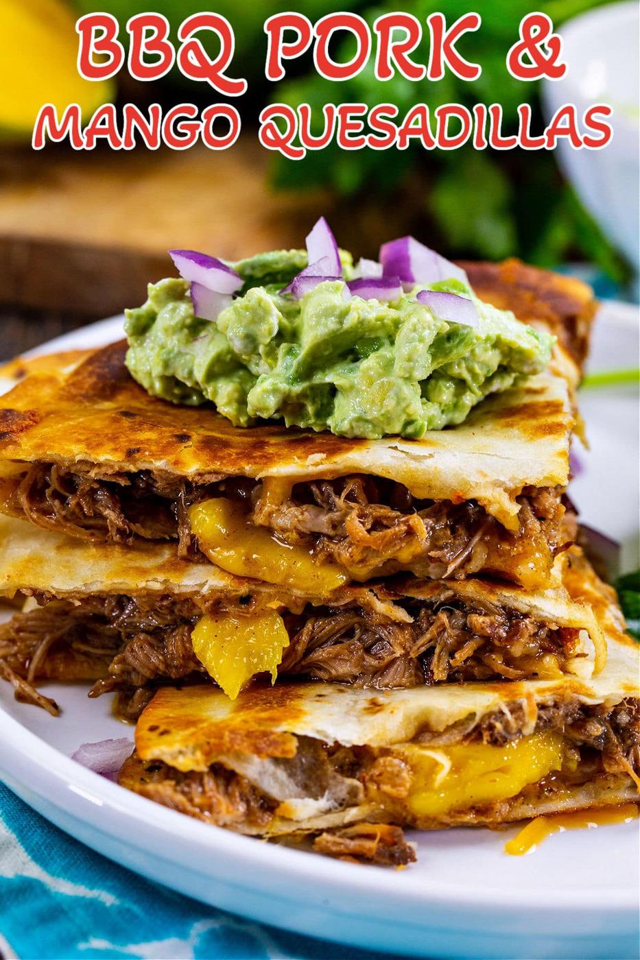BBQ Pork and Mango Quesadillas on a plate with fresh cilantro.