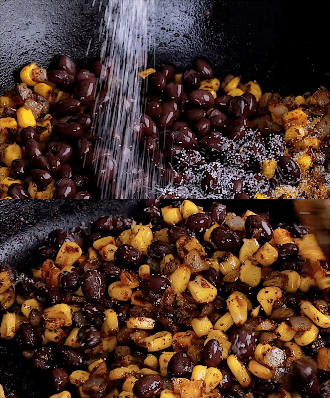 Black beans and salt added to pan.