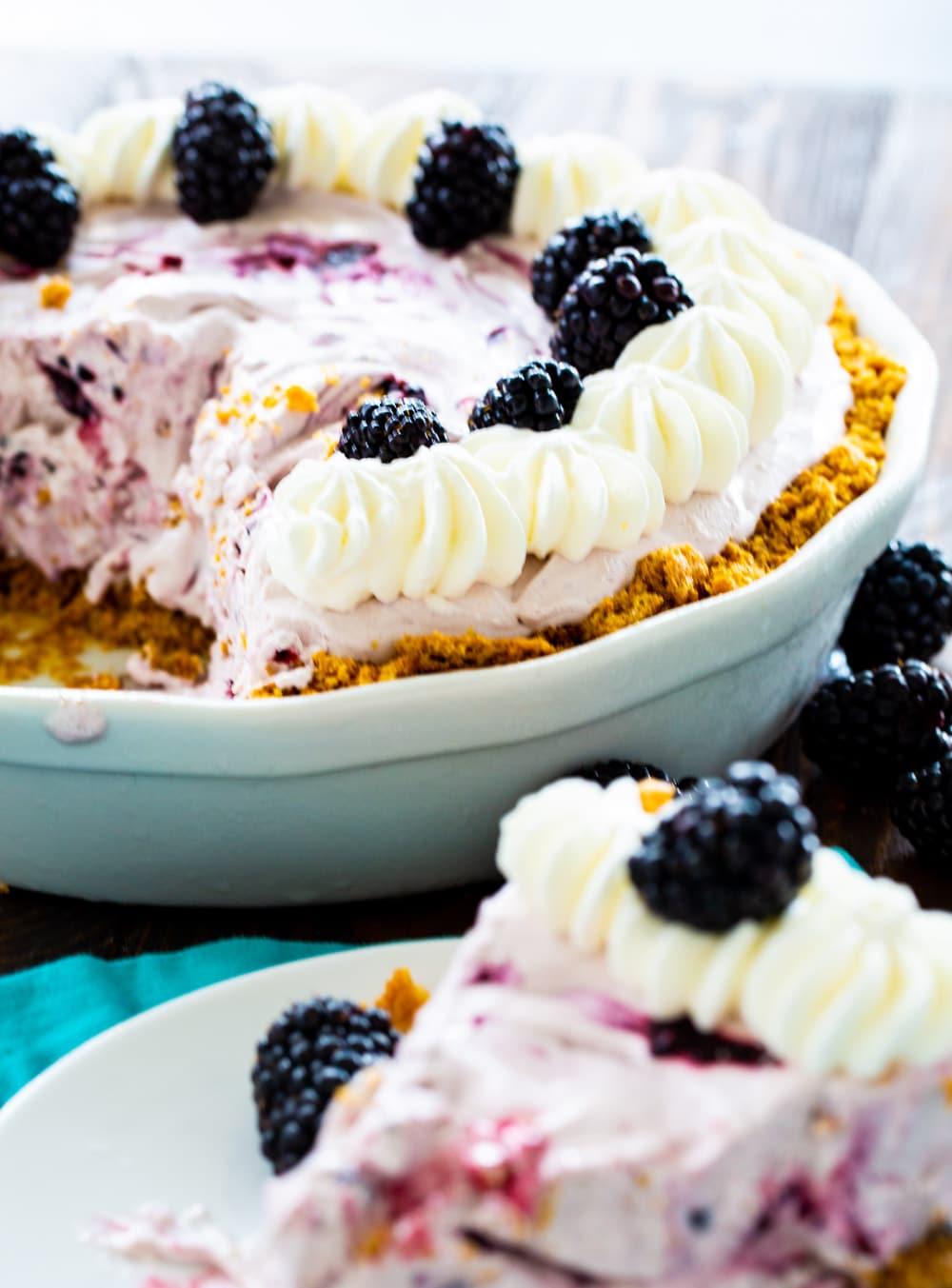 Blackberry Cheesecake Icebox Pie in a white pie pan.