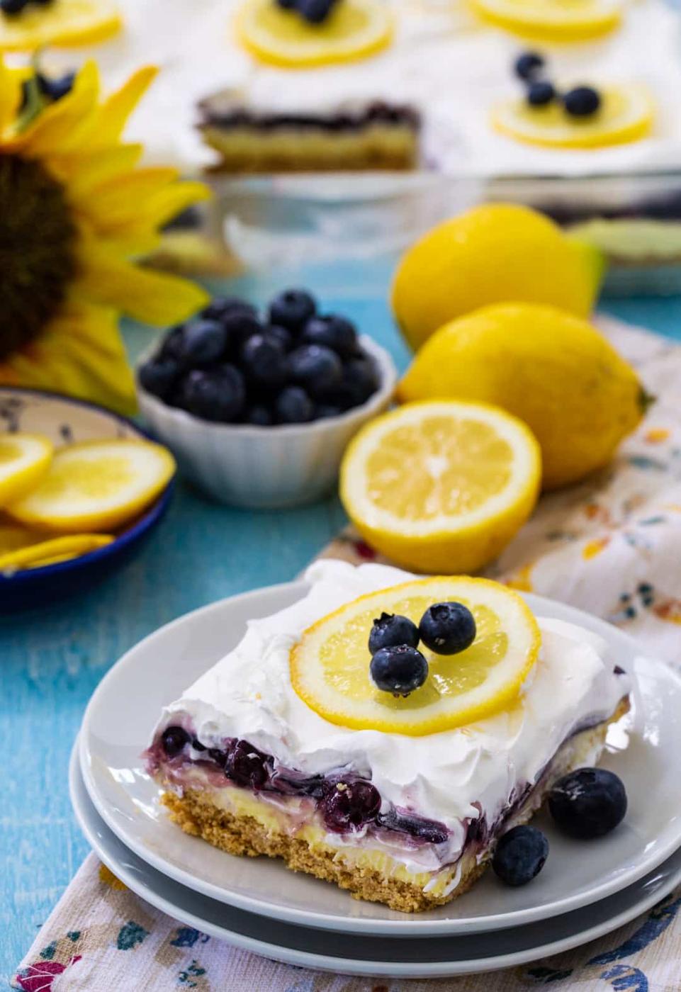 Blueberry Lemon Layer Dessert piece on a small plate.