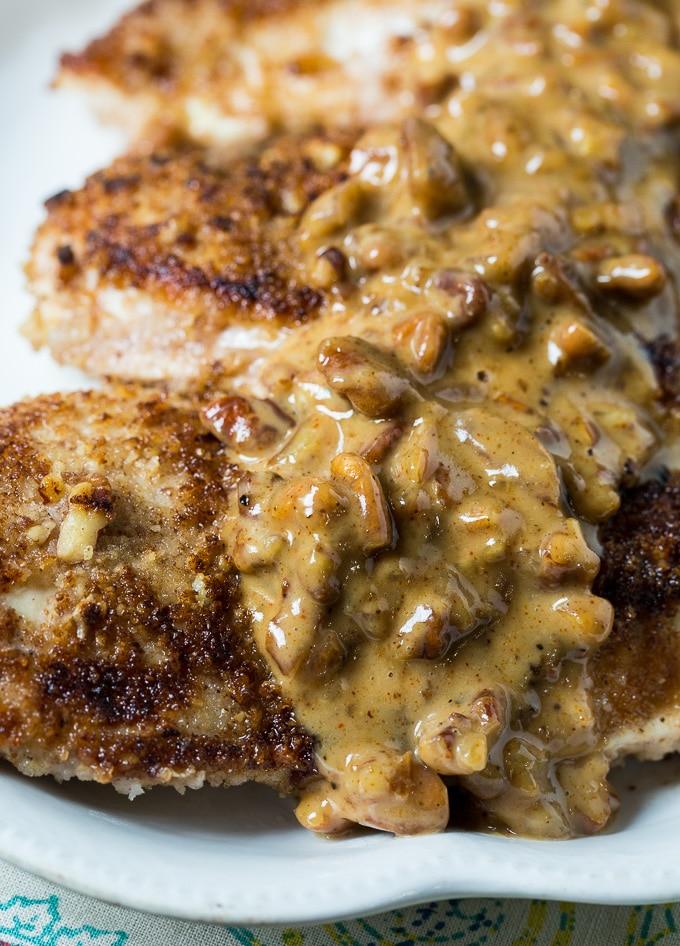 Pecan coated chicken in a creamy bourbon sauce.