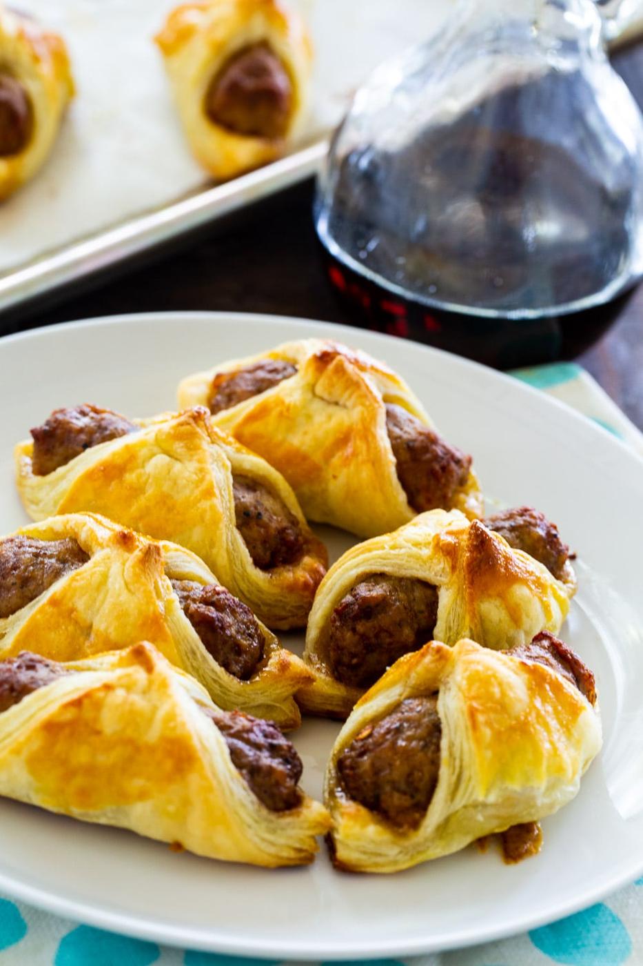 Breakfast Pigs in a Blanket on a plate.