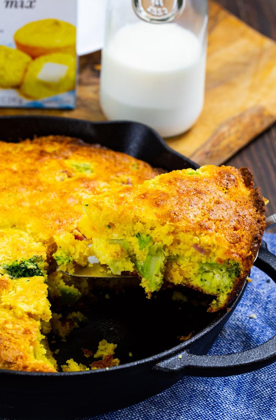 Slice of Ham Broccoli Cornbread being lifted up.
