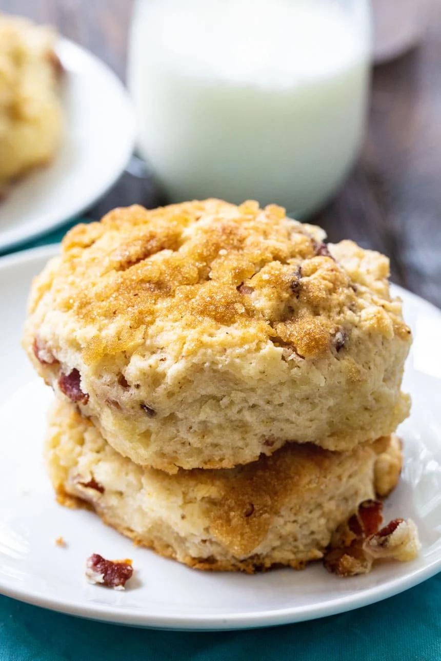 Bacon Brown Sugar Biscuits stacked on a white plate