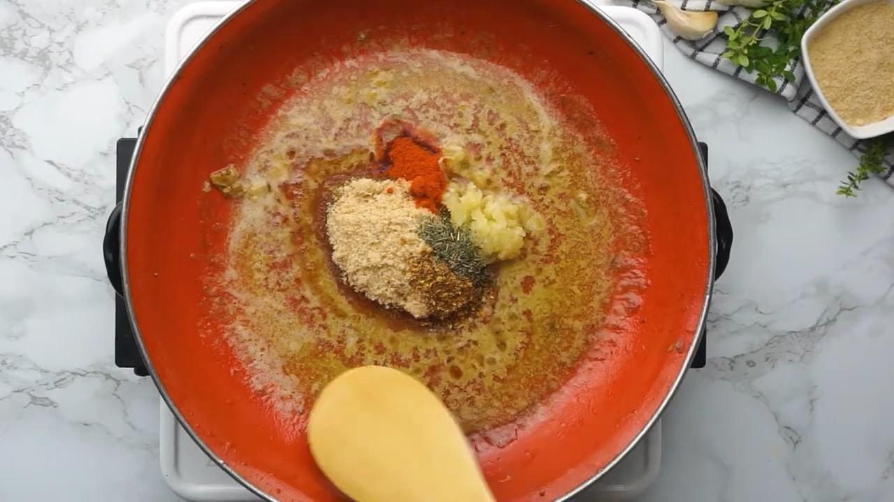Making pork chop glaze in skillet.