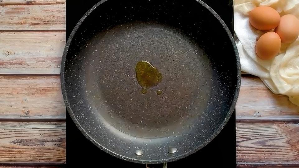 Heat oil in pan.