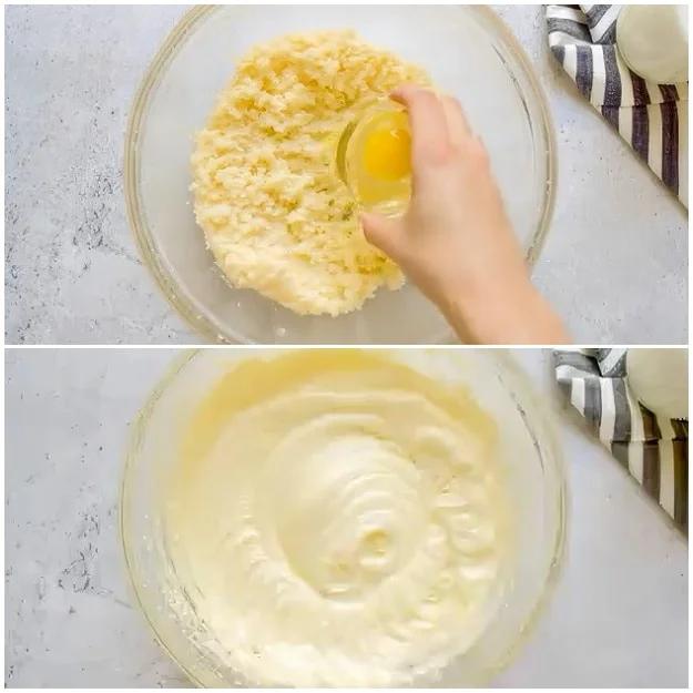 Mixing eggs into batter.