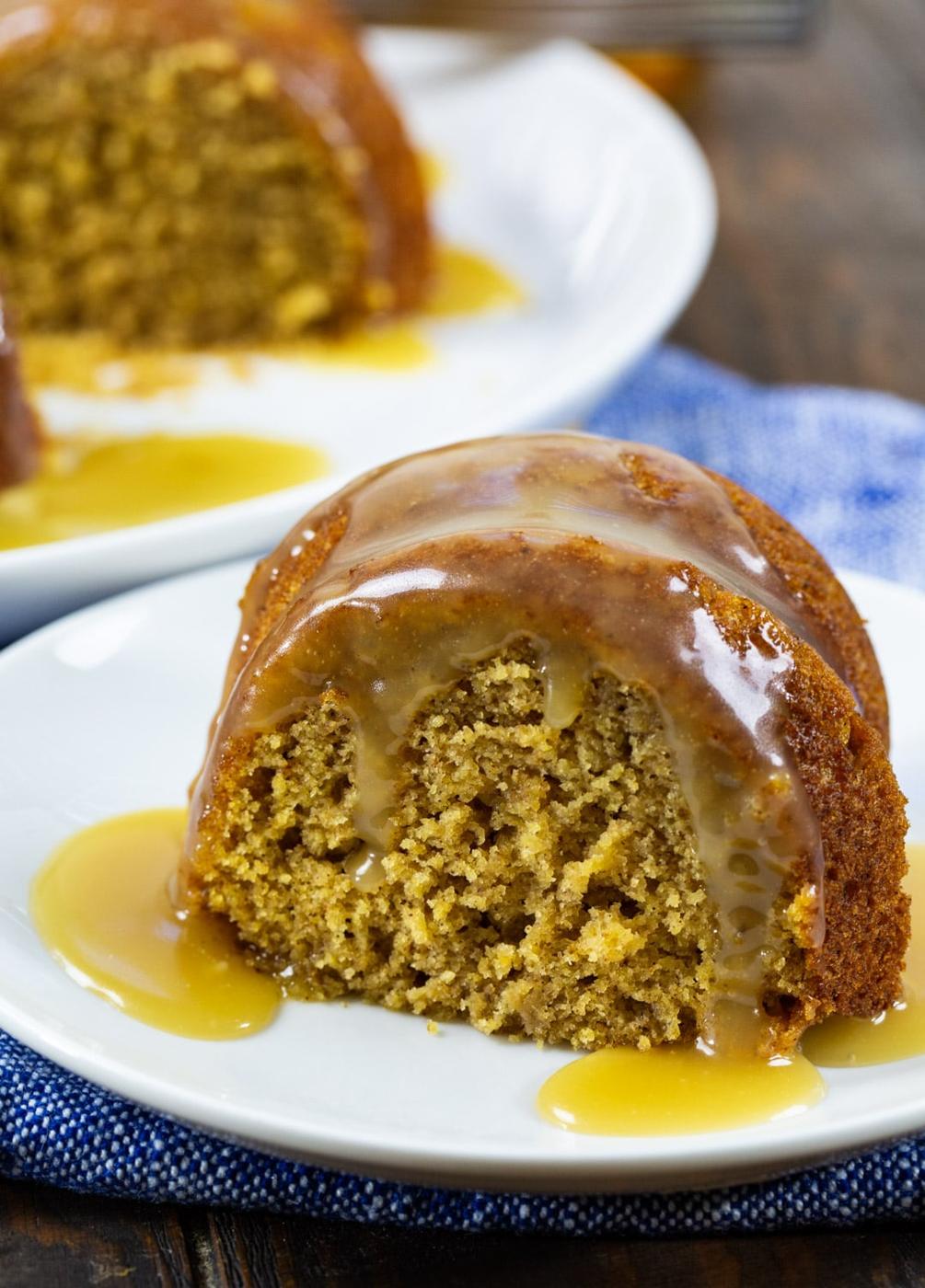 Butternut Squash Cake with Bourbon Glaze slice on a plate.
