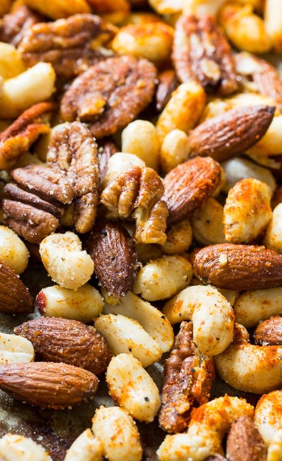 Cajun Nuts - make a great party snack or holiday appetizer. Flavored with plenty of spices, some sugar, and a little bacon grease!