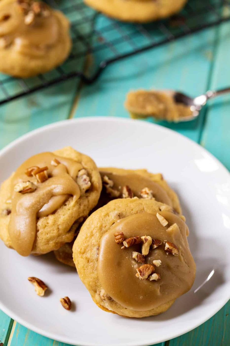 Three cookies on a plate.