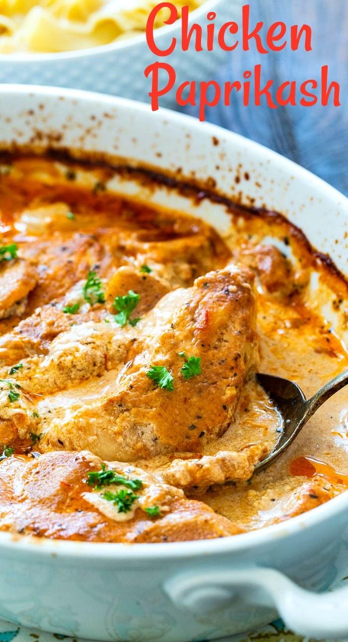 Chicken Paprikash in a white baking dish.