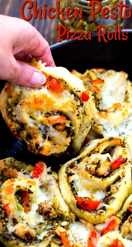 Hand picking up a pizza roll.