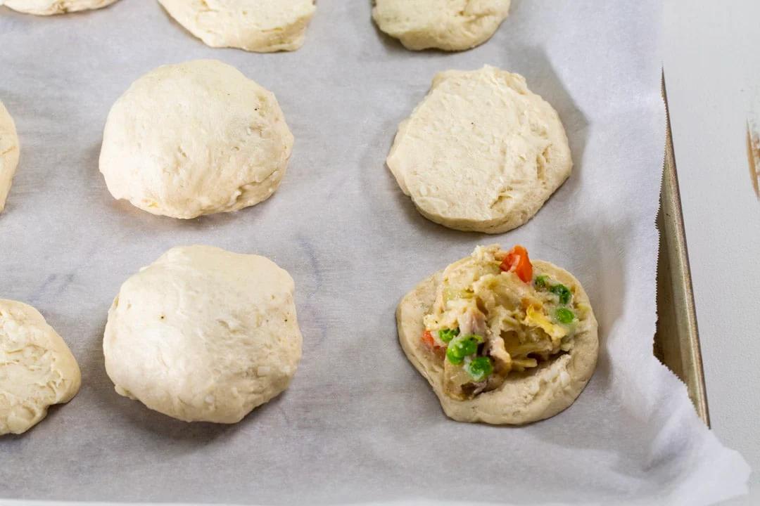 Biscuits being assembled.