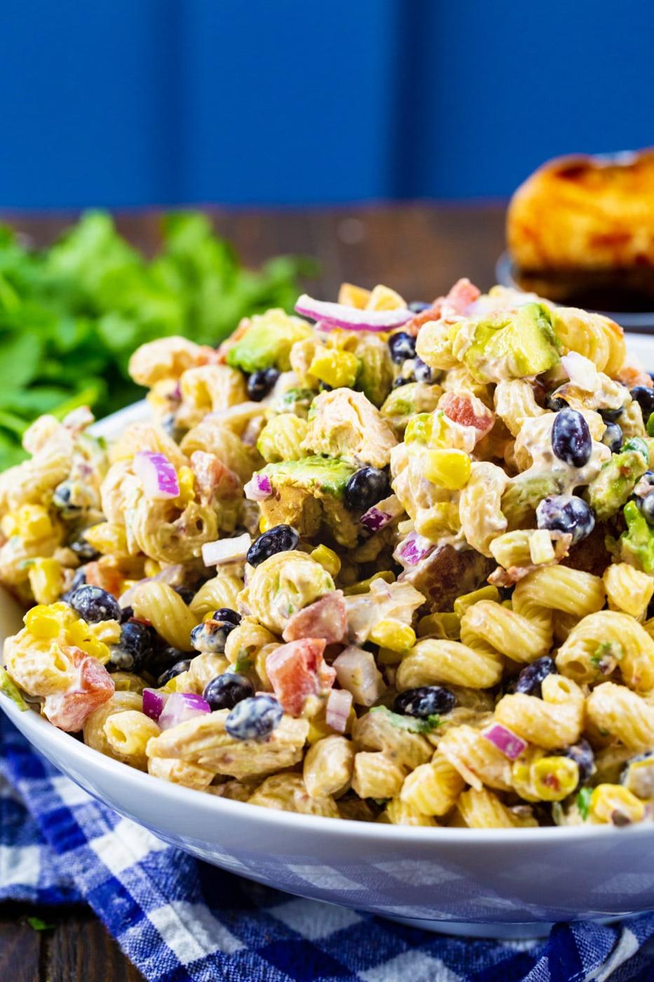 Chipotle Chicken Pasta Salad with bunch of cilantro.