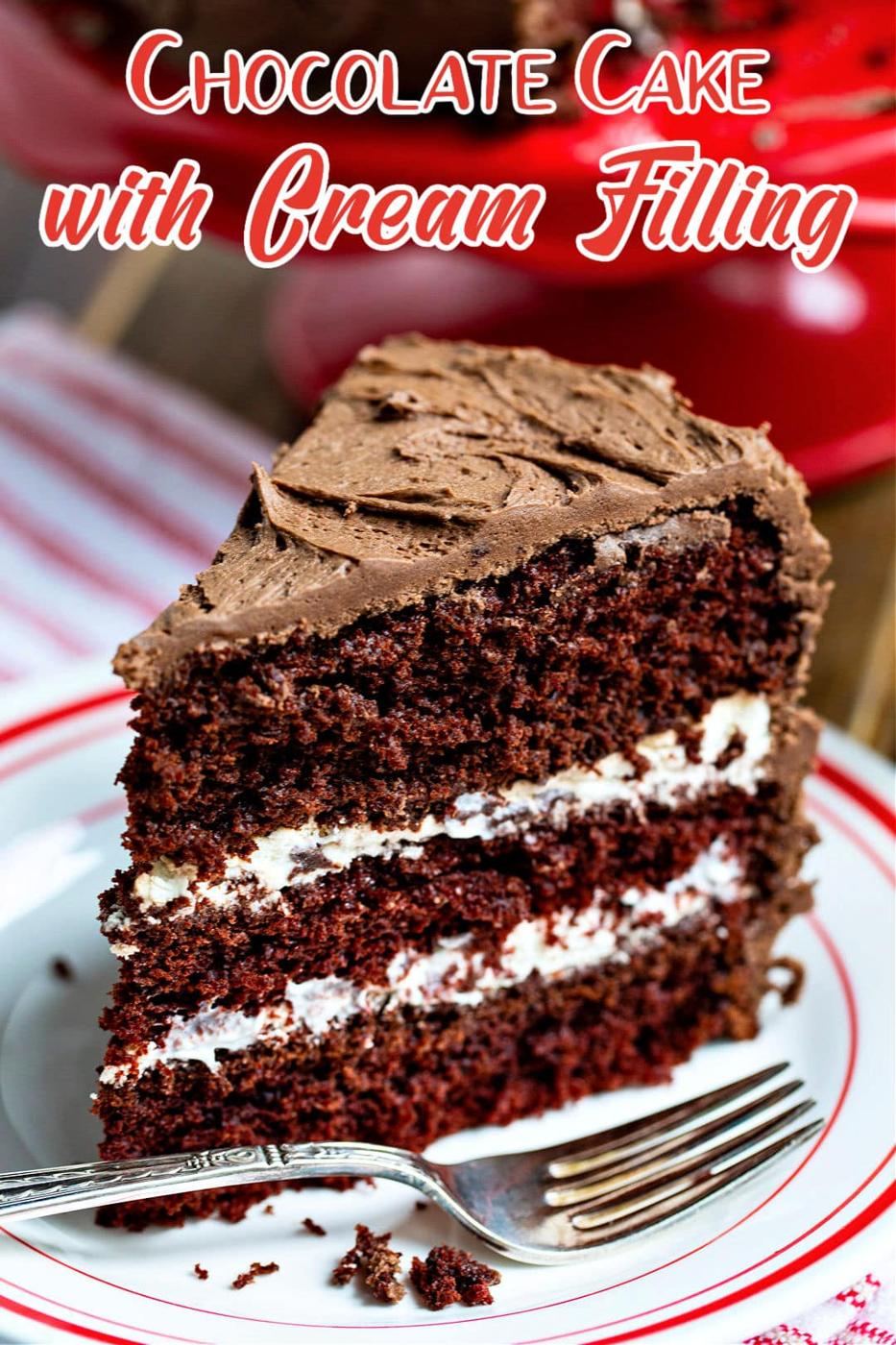 Slice of Chocolate Cake with Cream Filling on a plate.