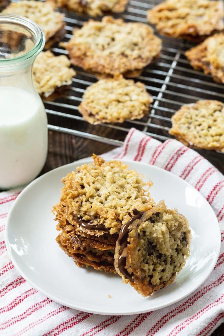 Florentine cookies on a plate with more on wire rack.