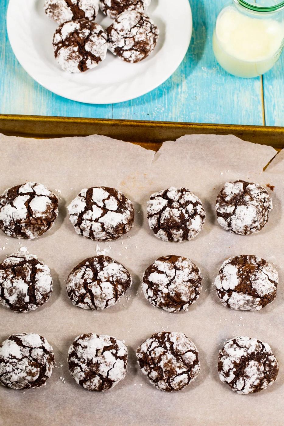 Cookies on baking sheet and on plate.