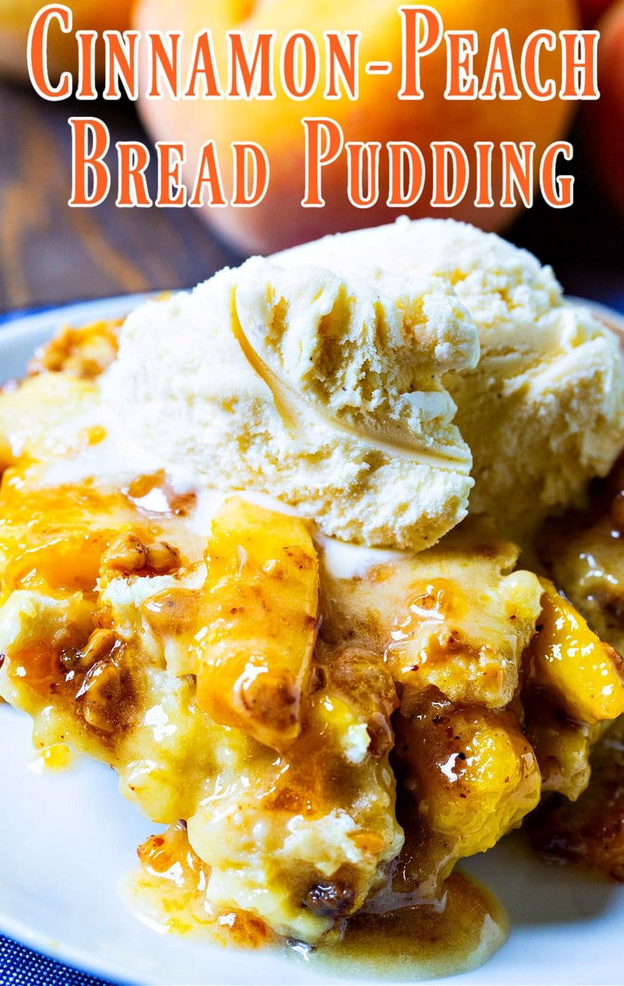 Piece of bread pudding topped with vanilla ice cream.