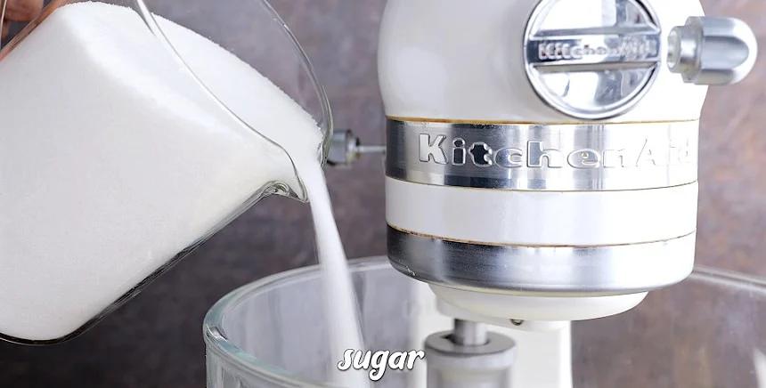 Adding the sugar.
