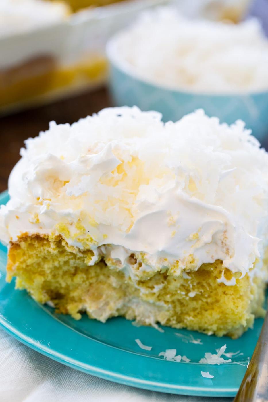 Slice of poke cake on a plate.