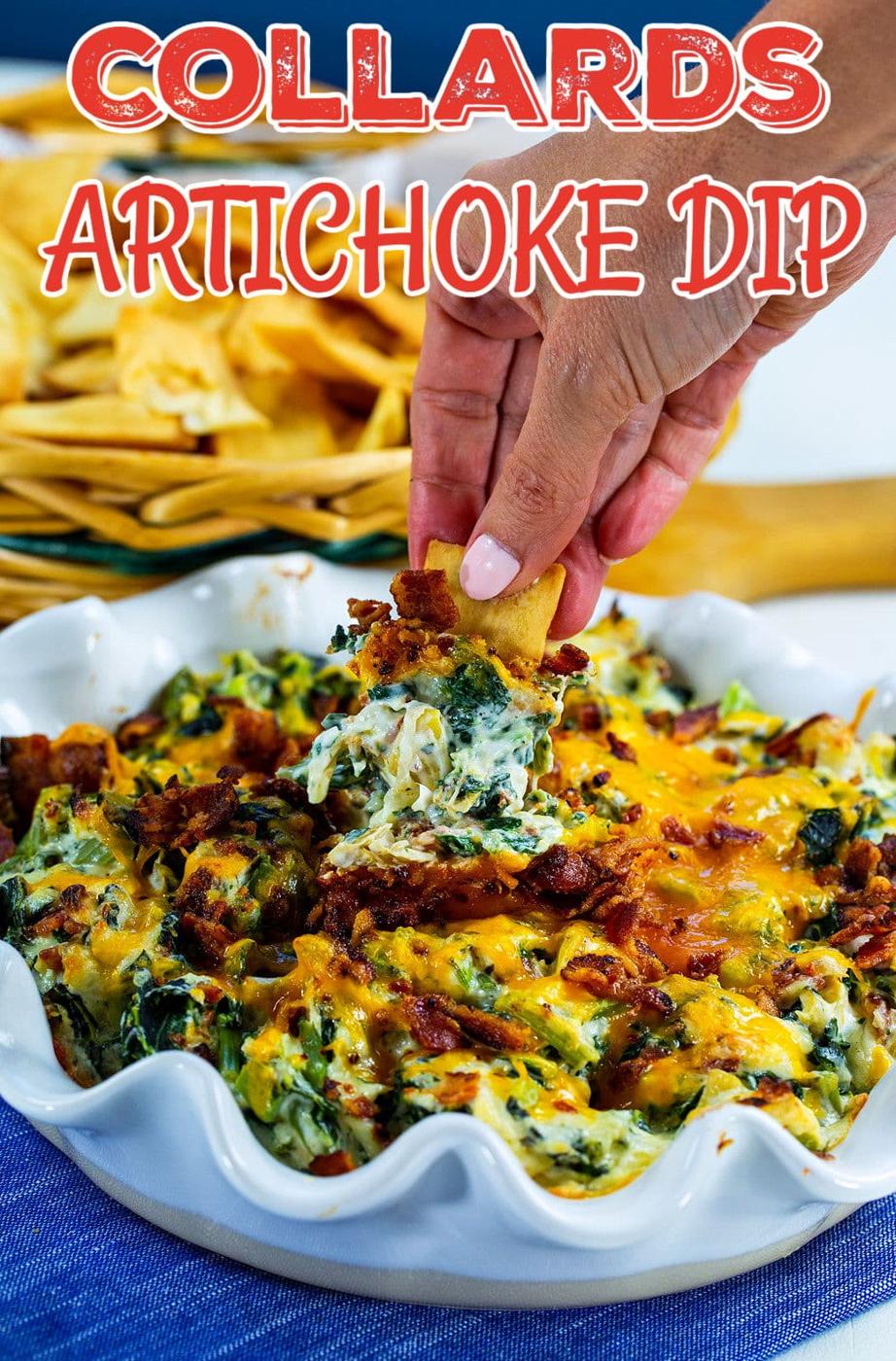 Pita chip scooping up Collards Artichoke Dip.
