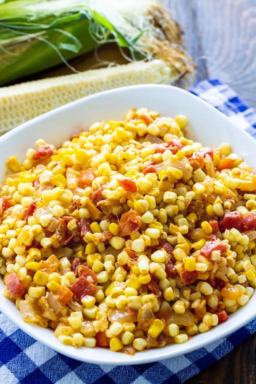 Corn Maque Choux woth fresh corn in background
