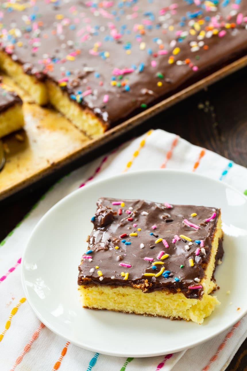 slice of Cream Cheese Sheet Cake on a white plate