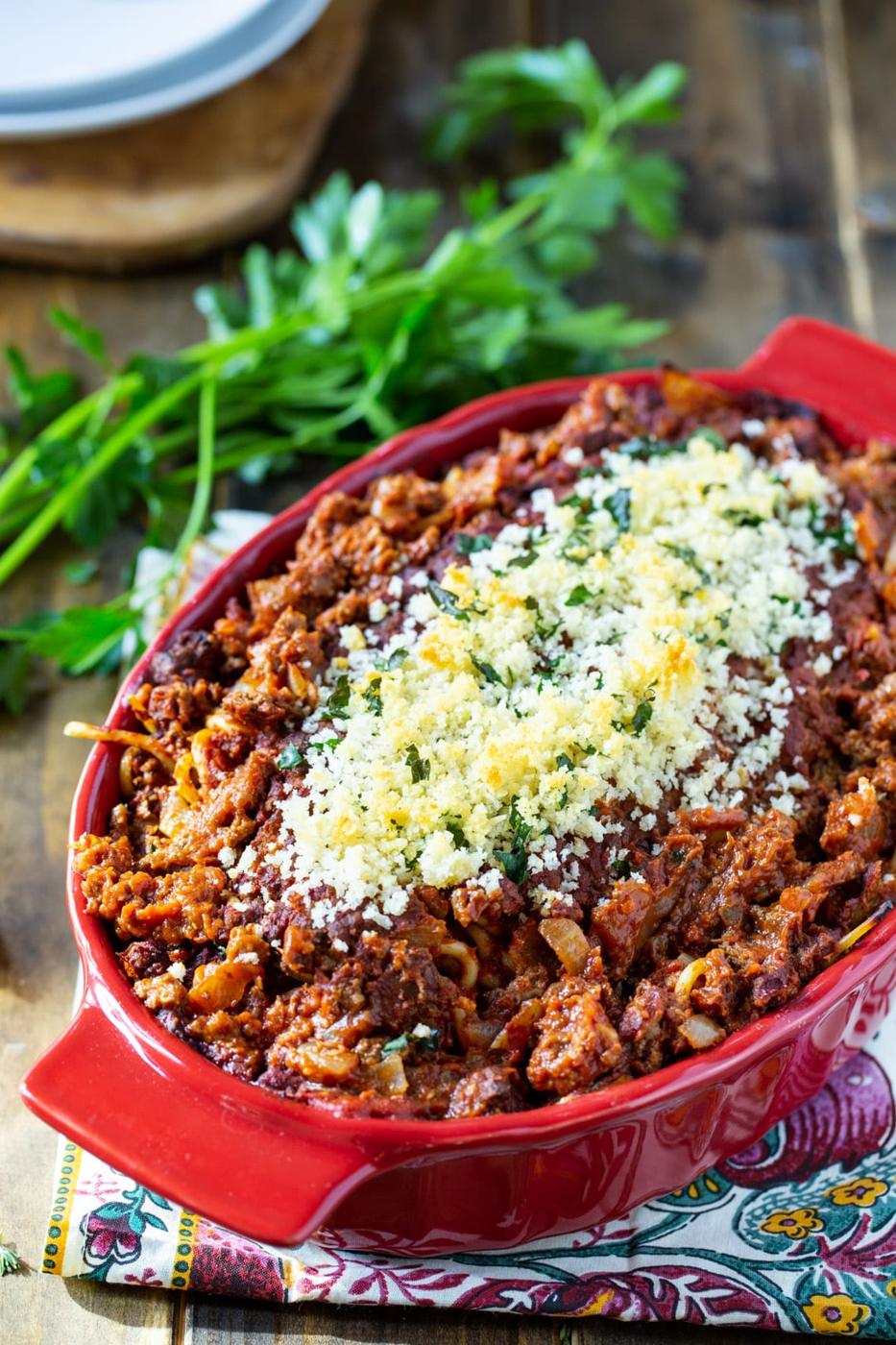 Spaghetti Casserole in a red casserole dish.