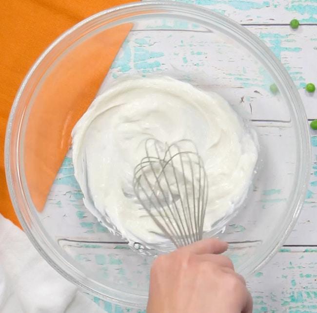 Mixing mayonnaise mixture.
