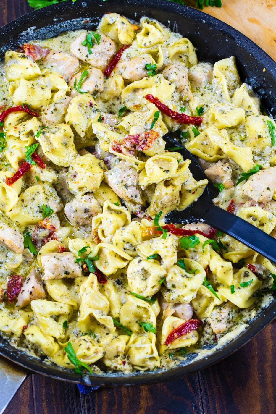 Pesto Tortellini with Chicken in a nonstick pan.