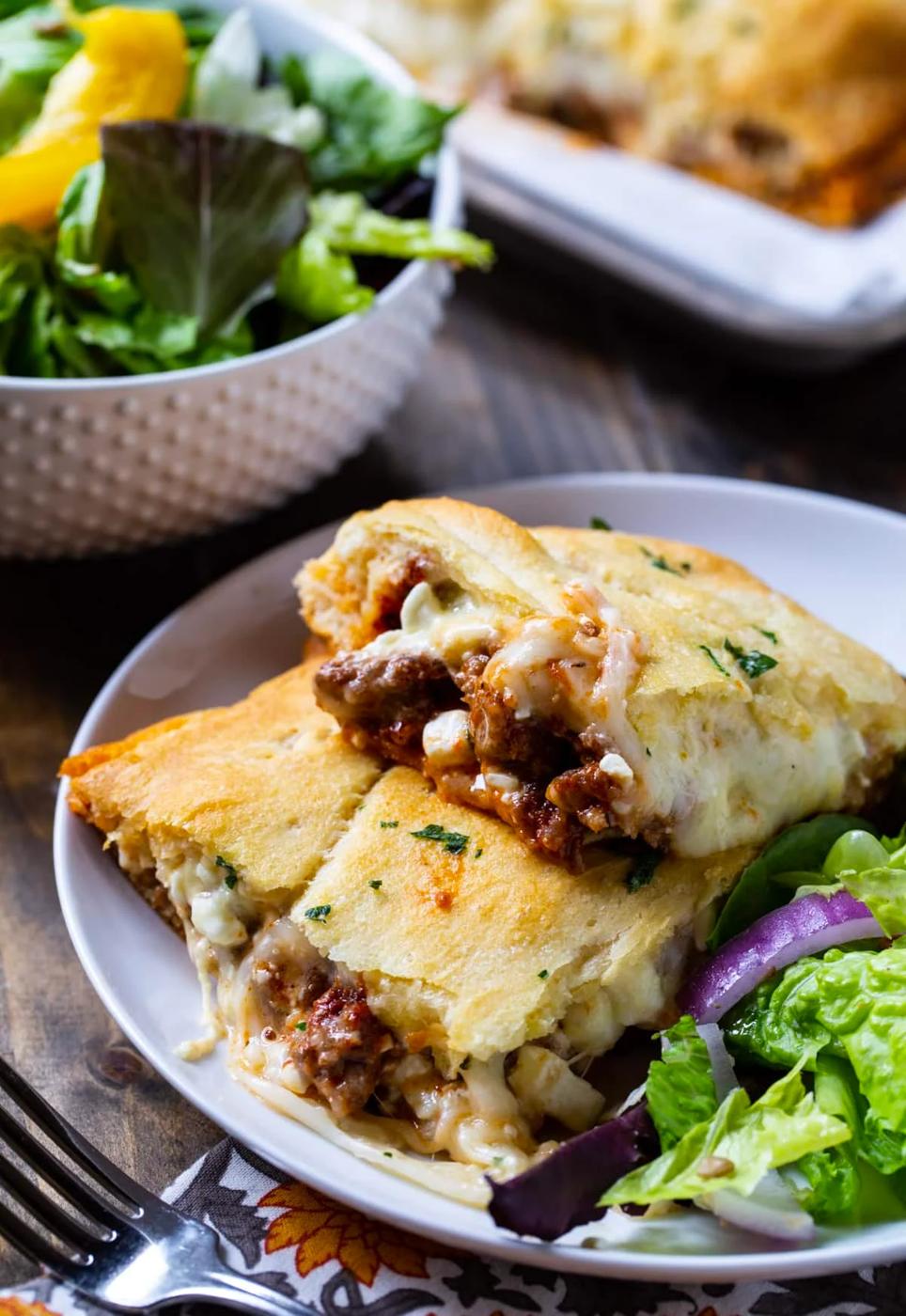 Crescent Lasagna on plate with salad.