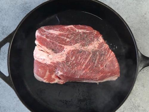 Searing the roast.