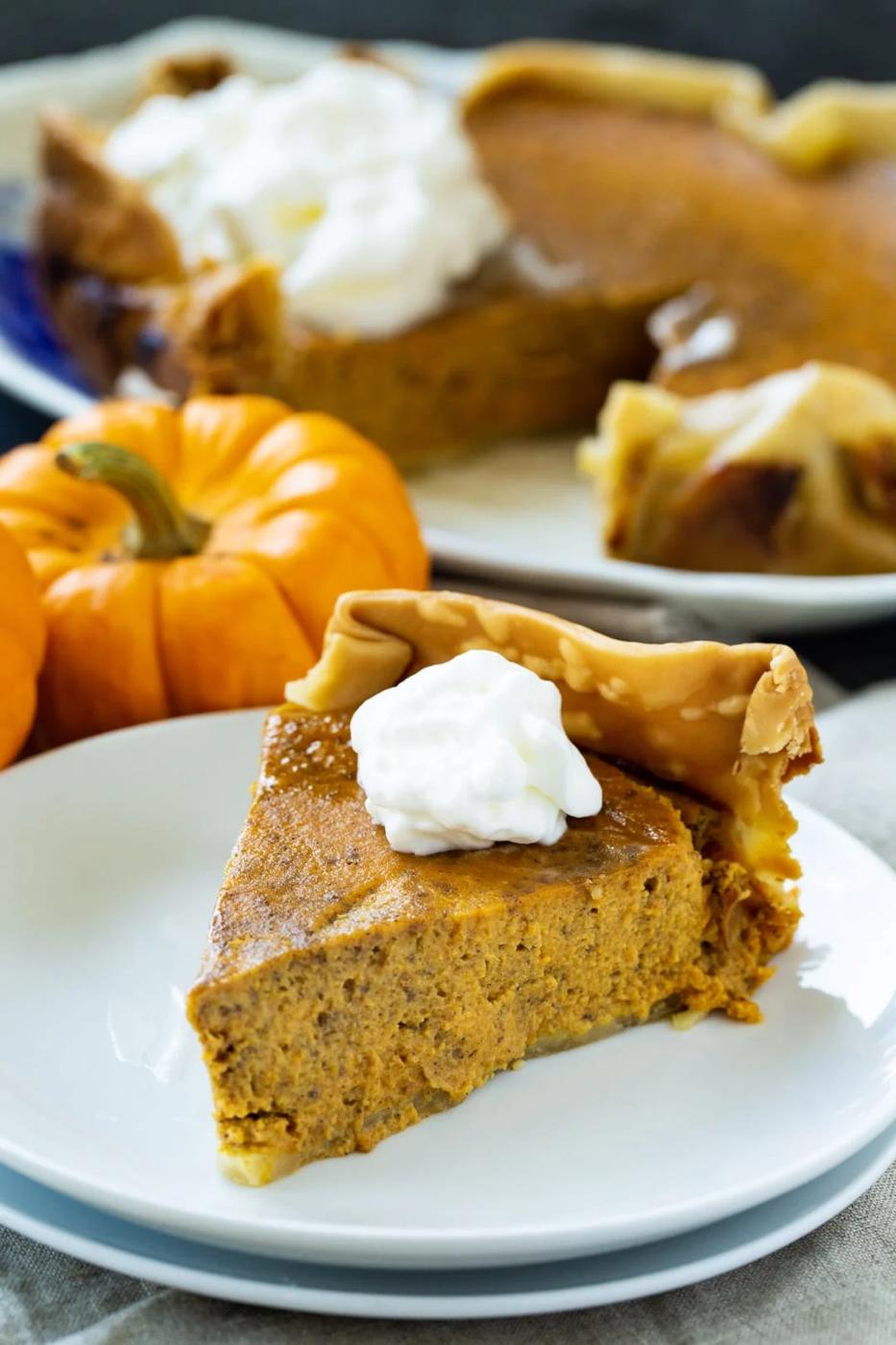 Whole Pumpkin Pie on a serving platter.