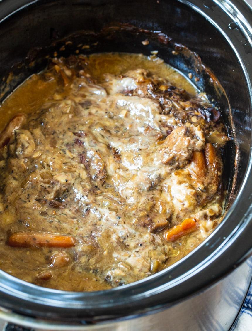 Roast with Mushrrom Gray in a black slow cooker.