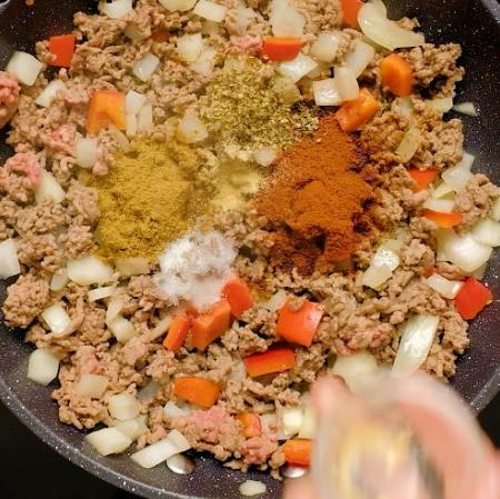 Adding spices.