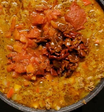 Adding Worcestershire sauce.