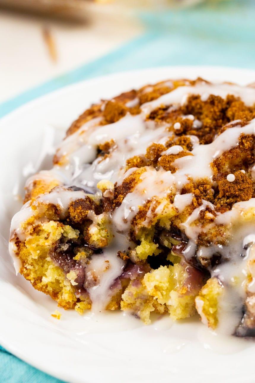 Slice of Blueberry Coffee Cake with glaze.