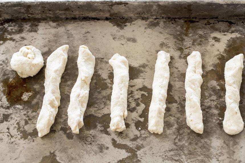 Biscuit dough stretched into ropes.