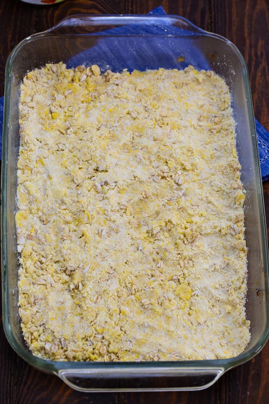 Oat crust in a 9x13-inch baking dish.