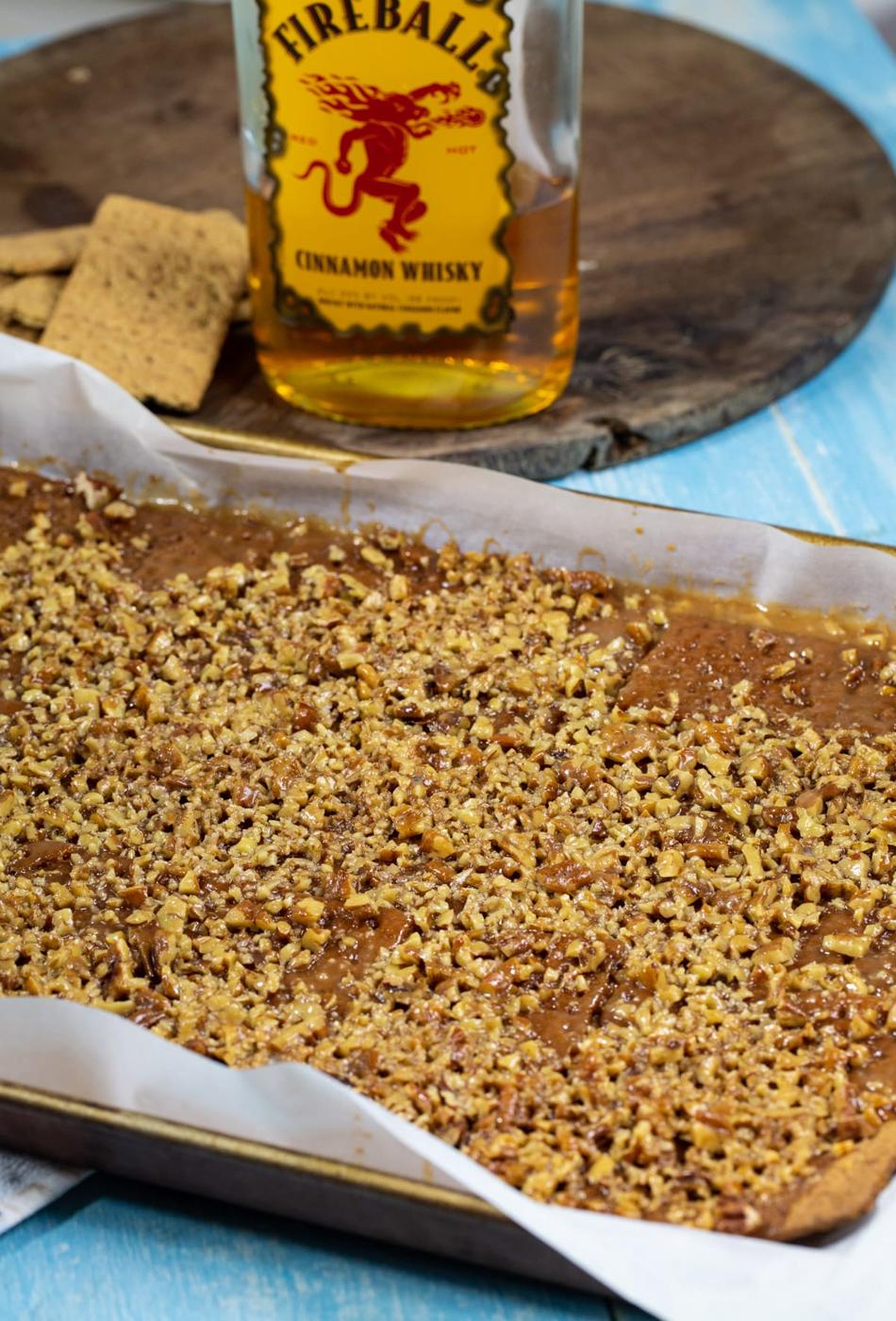 Candy on a rimmed baking sheet just after being removed from oven.