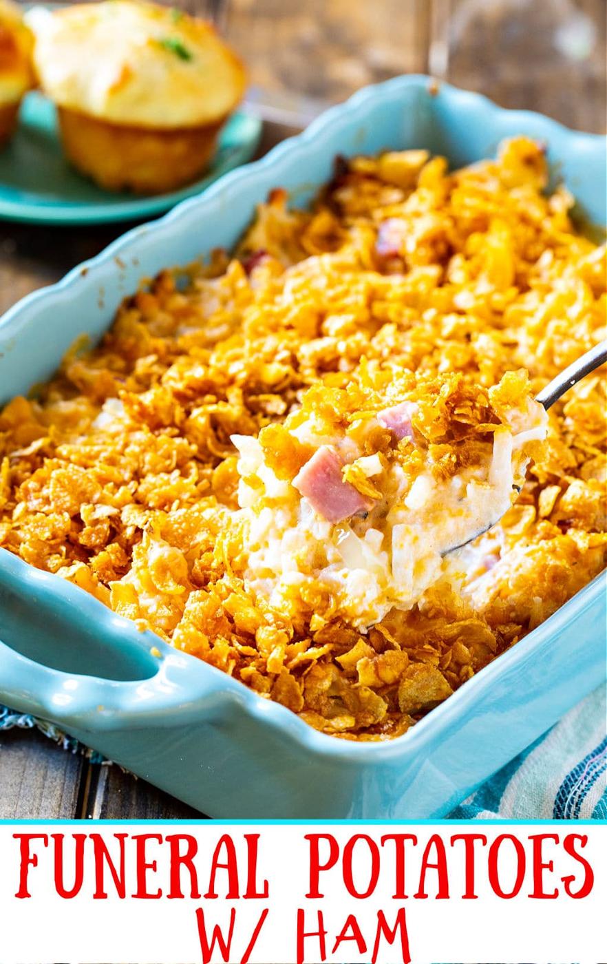 Casserole being scooped out of casserole dish.