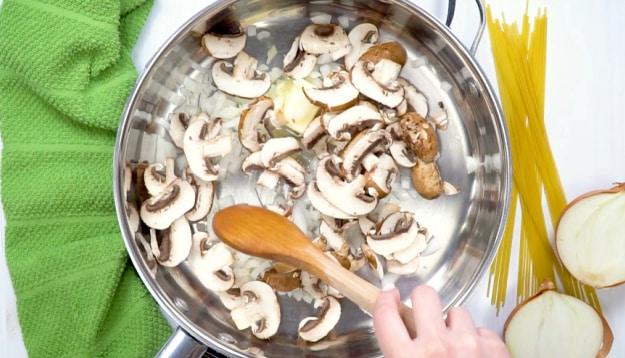 Cooking the onions and mushrooms.