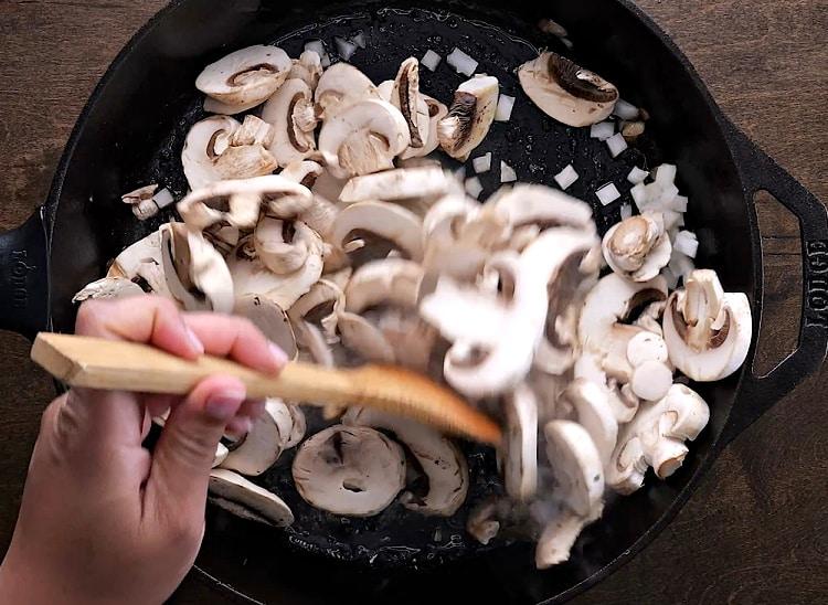 Cooking the mushrooms.