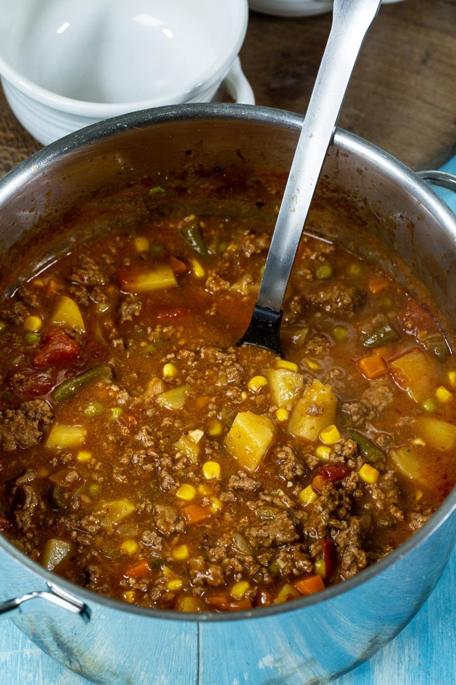 Hamburger Stew in a Dutch oven.