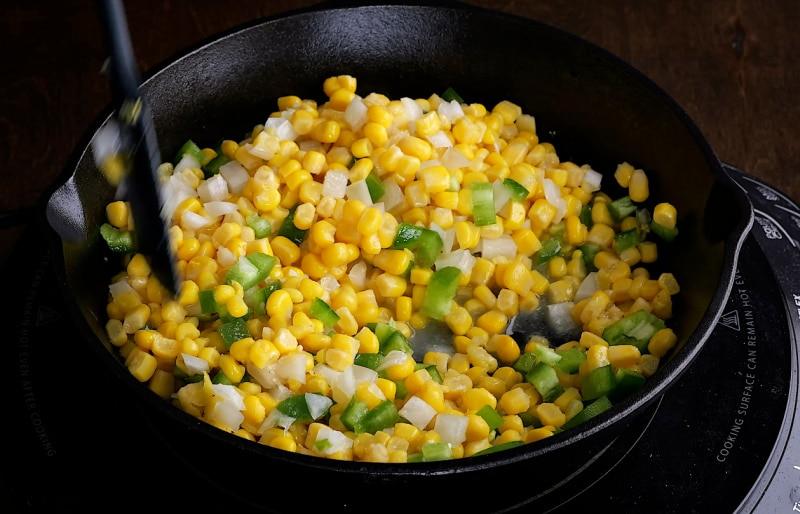 Sauteing corn mixture.